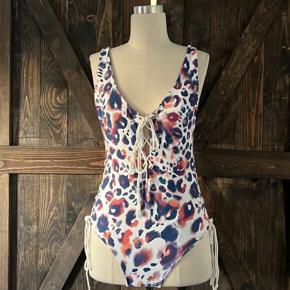 Aila Blue swimsuit with lace up tie side waist and front Sz- Medium - Picture 1 of 7